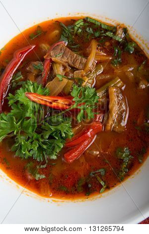 Traditional middle eastern soup with meat and pepper