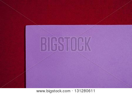 Eva foam ethylene vinyl acetate smooth bright purple surface on red sponge plush background