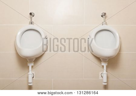 White Ceramic Urinals In For Men In Public Toilet