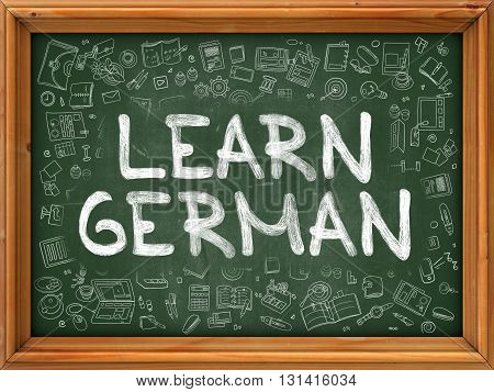 Learn German Concept. Modern Line Style Illustration. Learn German Handwritten on Green Chalkboard with Doodle Icons Around. Doodle Design Style of  Learn German Concept.