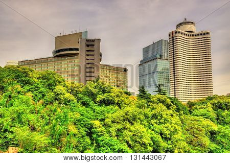 Tokyo cityscape above Benkei-bori moat in Japan