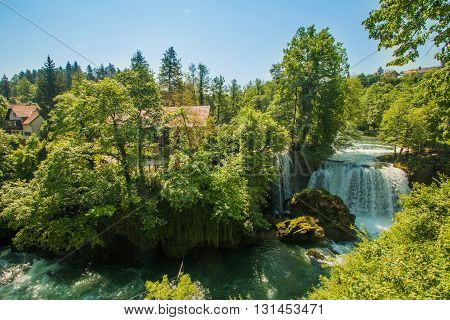 Waterfall on Korana river canyon and beautiful village of Rastoke near Slunj in Croatia