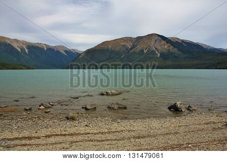 Lake Rotoiti and Mt Robert. Landscape in New Zealand. Cloudy summer day.