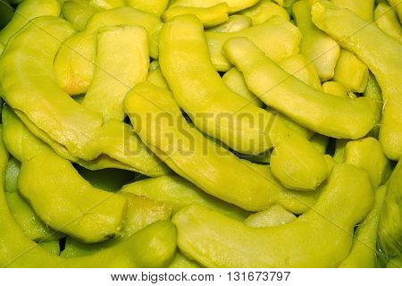 Heap of sweet pickled tamarind fruits for retail sale in Thailand food market. They are fruit preserves for long-term storage