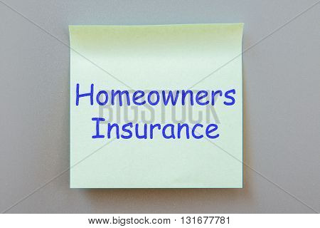 Adhesive note with inscription on a label. Front view