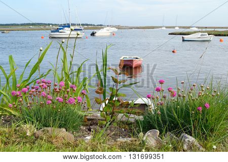 Sailing boats in Wells-next-the-sea harbor Norfolk England
