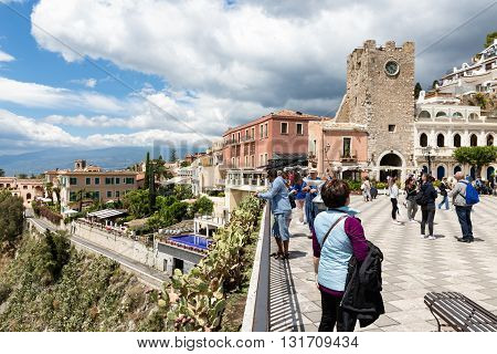 TAORMINA ITALY - MAY 21: Tourists at the main plaza of Taormina on May 21 2016 at the island Sicily Italy