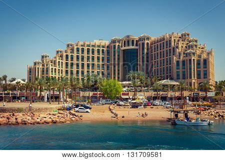 Eilat Israel - April 6 2015: Hotel Hilton Eilat Queen of Sheba shopping center and the beach.