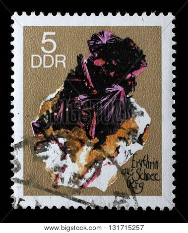 ZAGREB, CROATIA - SEPTEMBER 06: A stamp printed in GDR shows Erythrite from the series Minerals, circa 1969, on September 06, 2014, Zagreb, Croatia
