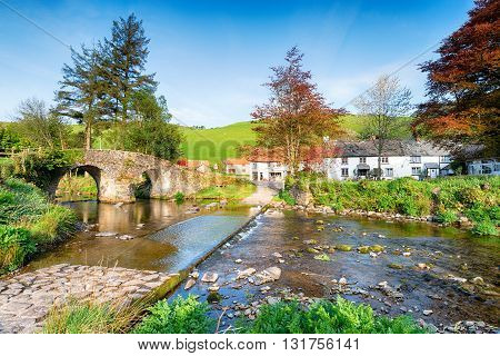 The bridge and ford at the picturesque hamlet of Malmsmead in the Doone Valley directly on the border between Somerset and Devon