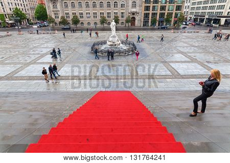 Berlin Germany - May 15 2016: view from Concert Hall of Berlin to the Gendarmenmarkt with unidentified people. The square was created by Johann Arnold Nering at the end of the 17th century.