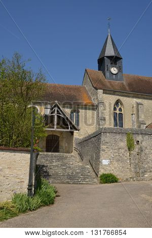 Montreuil sur Epte France - april 21 2015 : the saint Denis gothic church in spring