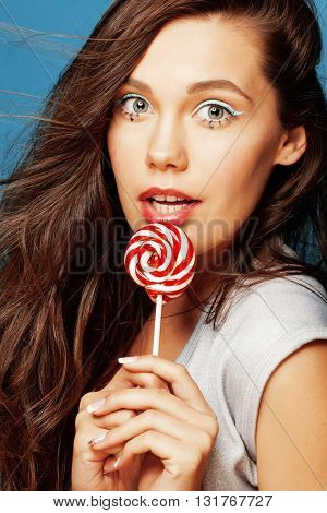 young pretty adorable woman with candy close up like doll makeup