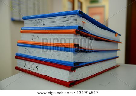 General Ledger which was printed by the year put on the office desk