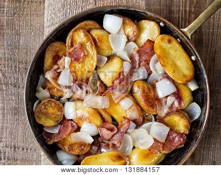 close up of rustic german home fries bratkartoffeln