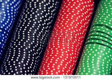 Red, blue, green and blsck chips for poker