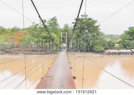 Long Rope Bridge Across The River In Village At Thailand Countryside, Folk Way Across Waterfall, Khe
