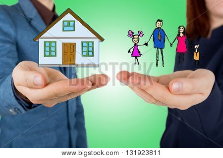 Family life insurance and proprety insurance protecting family family concepts.Man and woman hands making protection gesture.