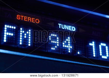 FM tuner radio display. Stereo digital frequency station tuned. Horizontal