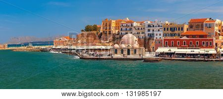 Panoramic view of old harbour of Chania with Venetian quay and Kucuk Hasan Pasha Mosque, Crete, Greece