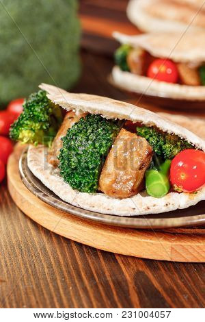 Vegetarian Seitan With Vegetables Inside Pita Bread