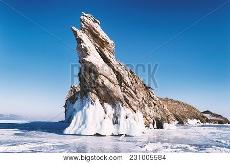 Frozen Baikal Lake On A Sunny Winter Day. Ogoy Cape