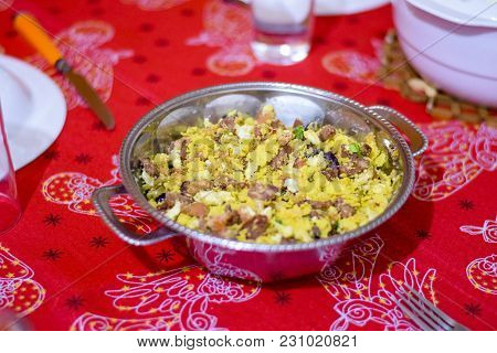 Farofa In A Metal Bowl On A Table