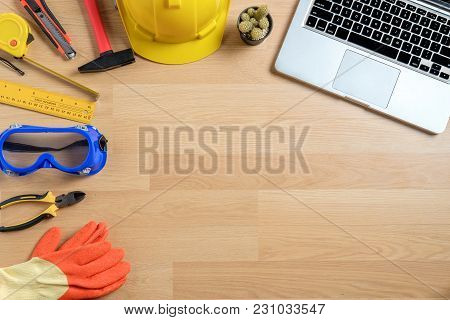 Office Desk With Computer, Cup Of Coffee And Engineer Equipment.top View With Copy Space. Background