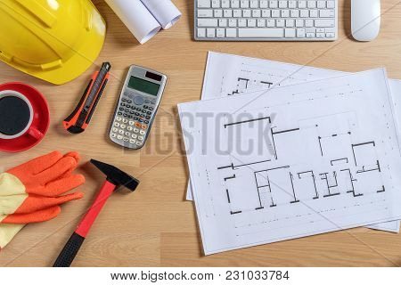 Office Desk With Computer, Cup Of Coffee And Engineer Equipment.top View With Copy Space. Background