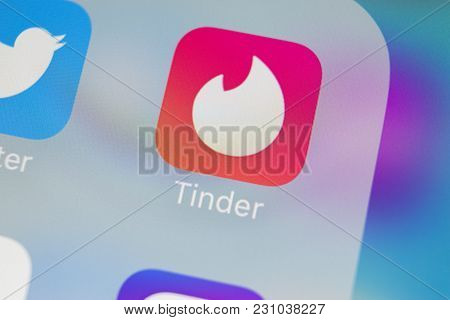 Sankt-petersburg, Russia, March 13, 2018: Tinder Application Icon On Apple Iphone X Screen Close-up.