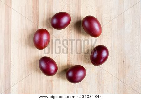 Red Colorful Easter Eggs On Wooden Background