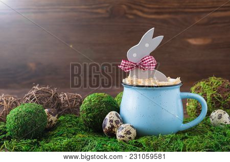 Wooden Polka Dot Grey Rabbit In A Blue Cup On The Grass Background, Easter Postcard Concept, Toned