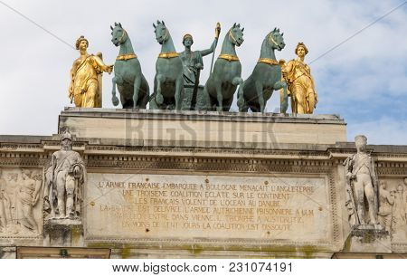 Paris, France - March 28, 2017: The Carrousel Triumphal Arch Arc de Triomphe du Carrousel in front of the Louvre