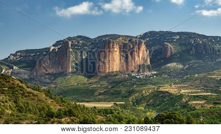 Complete View Of Riglos Mallets And Town With -el Puro-