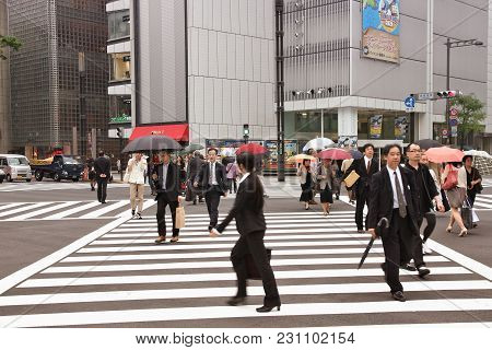 Tokyo, Japan - May 9, 2012: People Visit Sukiyabashi Crossing In Ginza, Tokyo. Sukiyabashi Crossing 