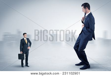 Giant businessman being afraid of small serious executor with suitcase