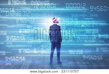 Businessman in vr glasses with variable fast changing numbers around