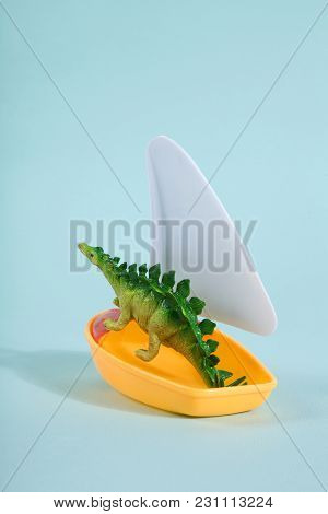 Dinosaur On A Boat