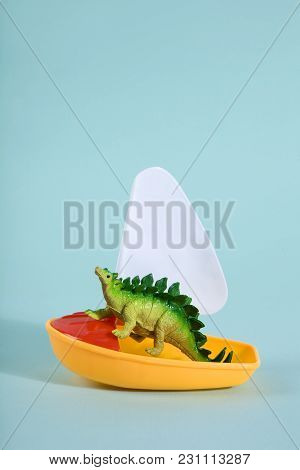 Dinosaur On A Boat