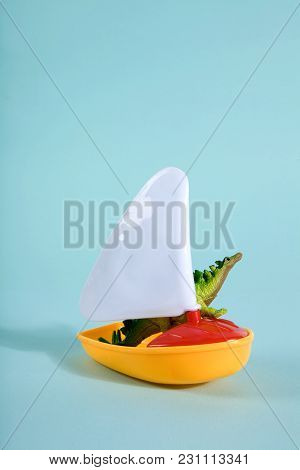 Dinosaur On A Boat