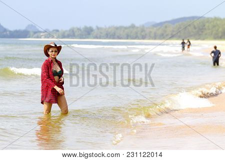 Women With Hat Relax Daylight On Beach At Bang Beot Beach, Chumphon Province Thailand