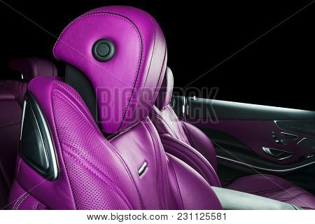Modern Luxury Car Inside. Interior Of Prestige Modern Car. Comfortable Leather Red Seats. Pink Perfo