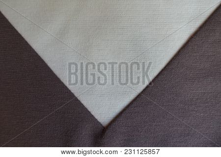 Ivory Triangular Gusset Sewn To Brown Fabric