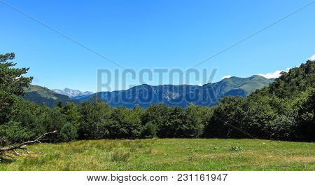 Panorama To Aran Valley, Mountainous Border In Spain And France, In The Catalan Pyrenees, Spain