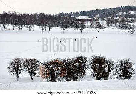 Frozen And Snowy Bogstadvannet Lake With Cross Country Tracks.