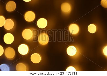 Golden Abstract Bokeh Lights. Defocused Background.bokeh Lights. Beautiful Christmas Background.luxu