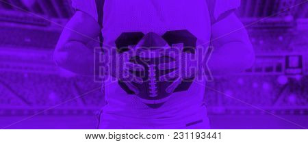 duo toned american football player in  arena at night with stadium lights