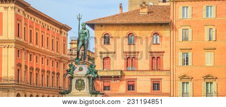 Architecture Panorama Of Bologna City In Emilia Region Of Italy. Neptune Bronze Statue And Restored 