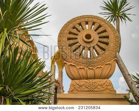 Dharmacakra Statue. Dharmacakra  Respect Of A Buddhist.