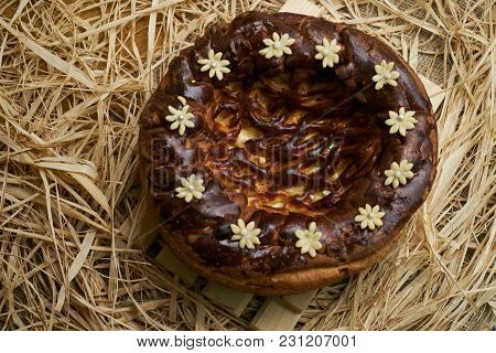 Traditional Ukrainian Wedding Bread Korovai Or Karavai With Decorations On Rustic Straw Background.